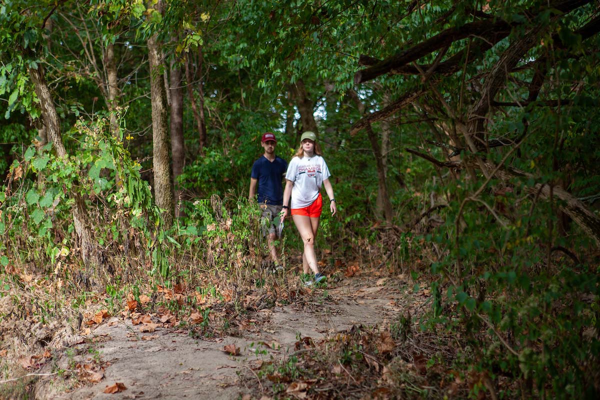Two students embark on a trail in one of the many natural areas around Oxford, Ohio