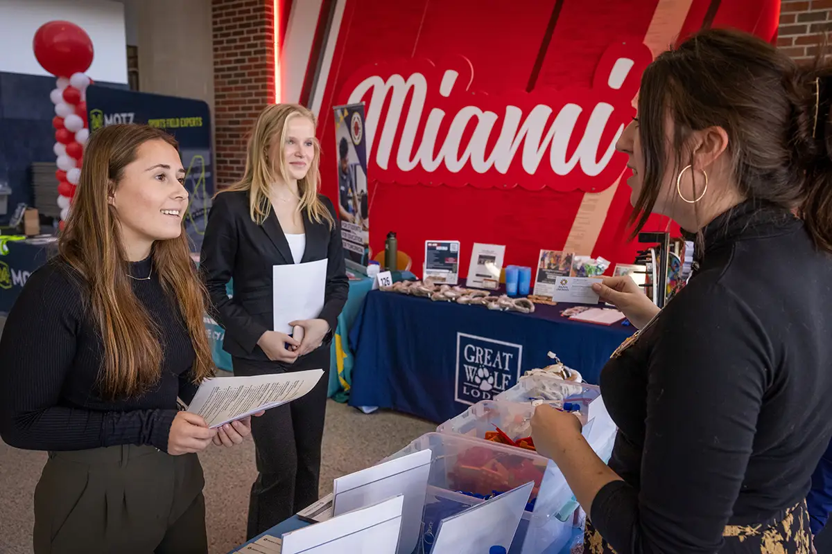 Students meeting employers at a Career Fair.