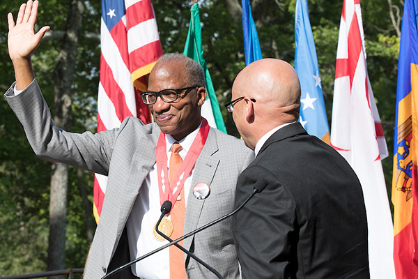 Miami President Gregory Crawford awarded the President's Medal to Wil Hayood in 2018.