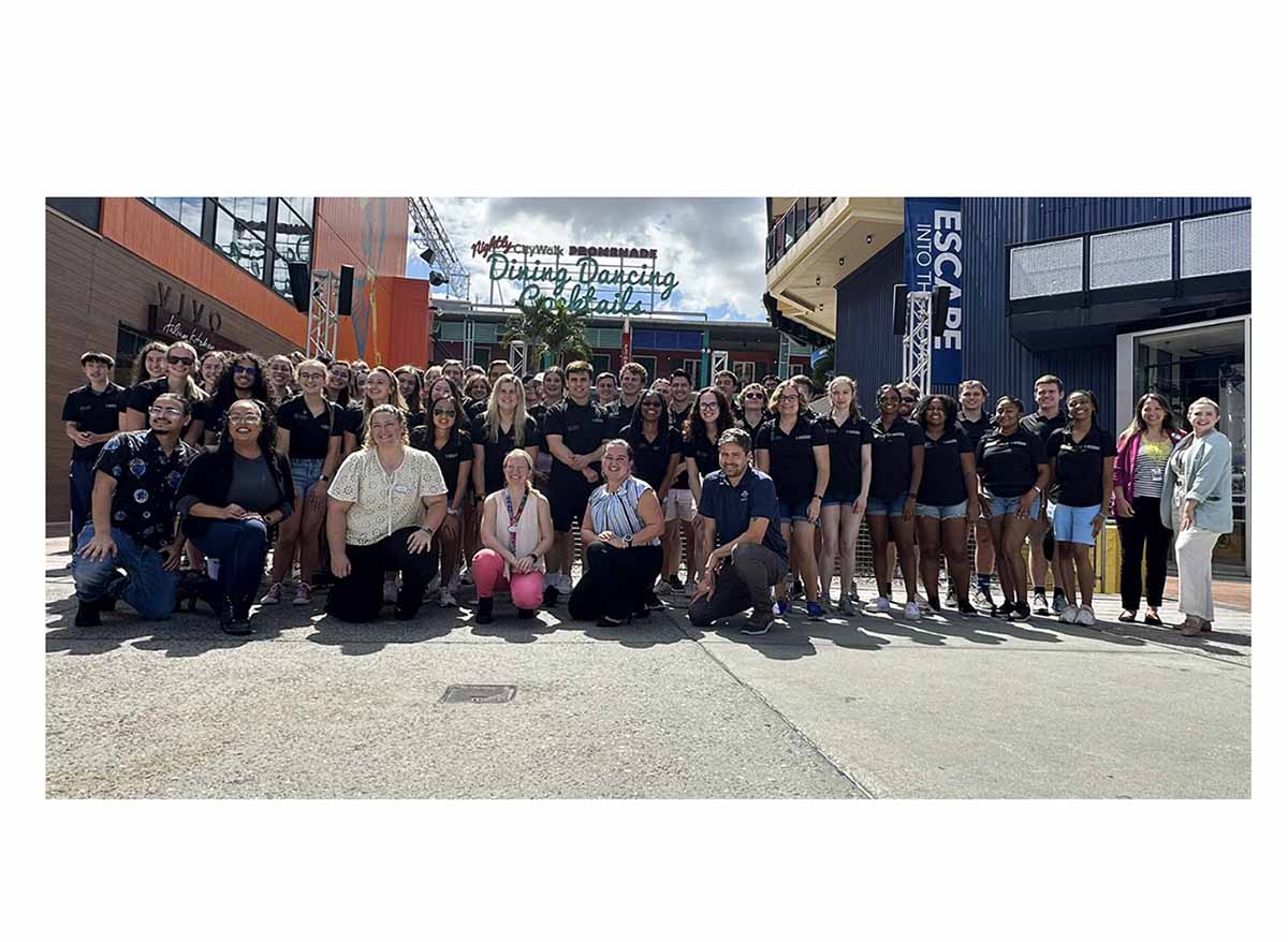 about 60 of the 2023 astronaut scholars pose at Universal Studios FL