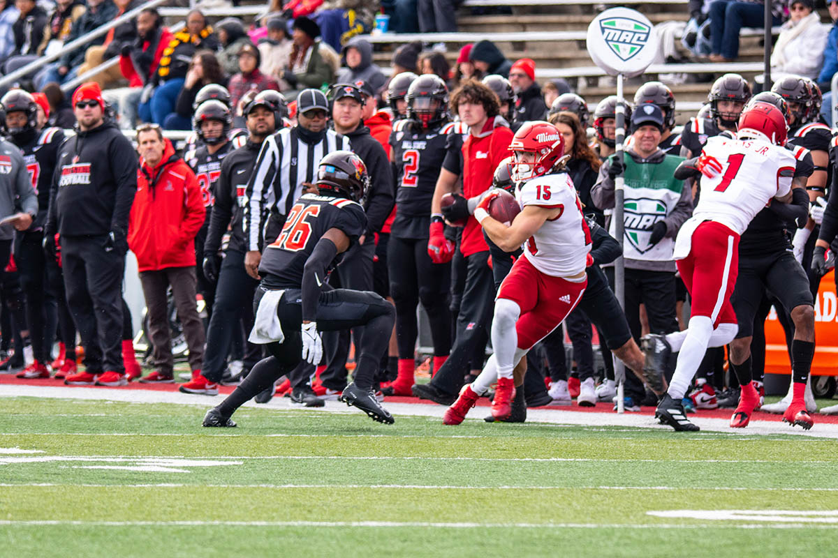 Miami's Cade McDonald tries to evade a defender