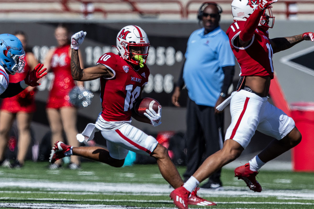 Miami's Gage Larvadain runs with the football