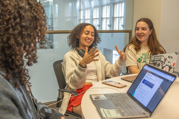 A student gestures during a discussion in the Constructive Dialogue pilot program.