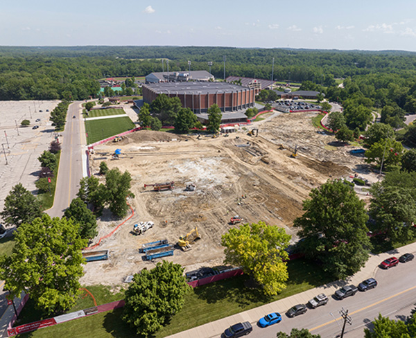 Millett Hall and south lawn , after geothermal well drilling completed 