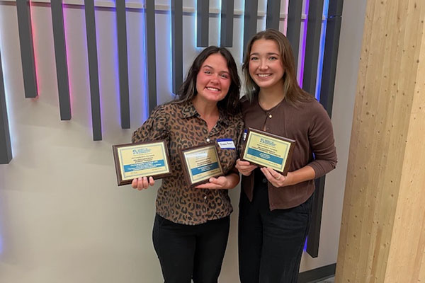 Anna Reier and Taylor Stumbaugh of the Miami Student