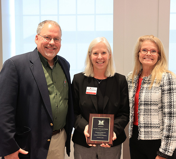 Mike Crowder, dean of the Graduate School, Kelly Knollman-Porter, and University Ambassador Dr. Renate Crawford at the Graduate Research Forum awards ceremony (photo by Scott Kissell)