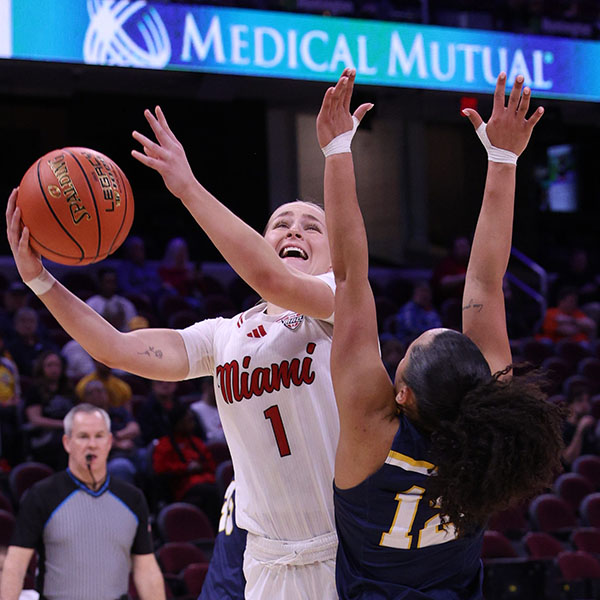 Miami's Amber Scalia goes to the basket against Kent State.