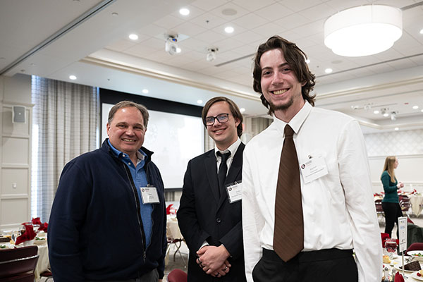 Douglas Coffin, left, with Miami University students